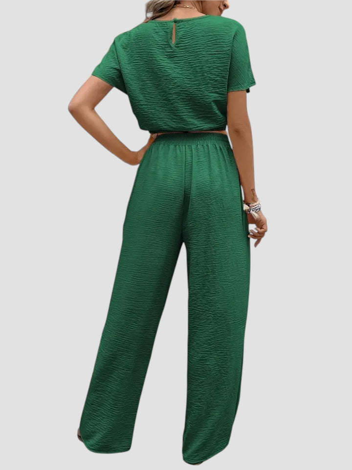 Mirella – Completo moderno con crop top e pantaloni fluidi