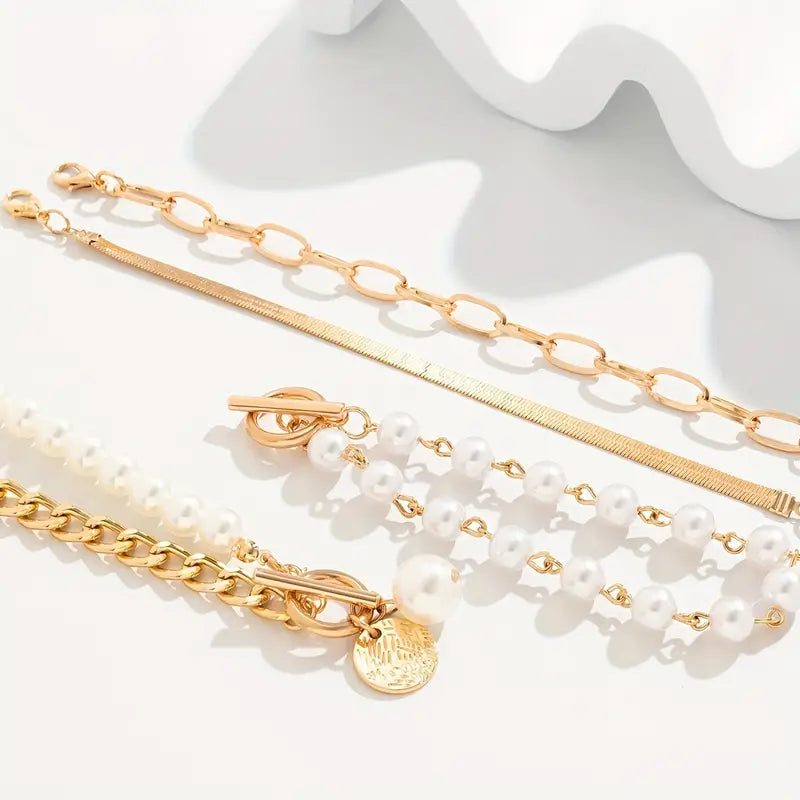 Set di bracciali chic in oro (4 pezzi) – serpente, perle e maglie