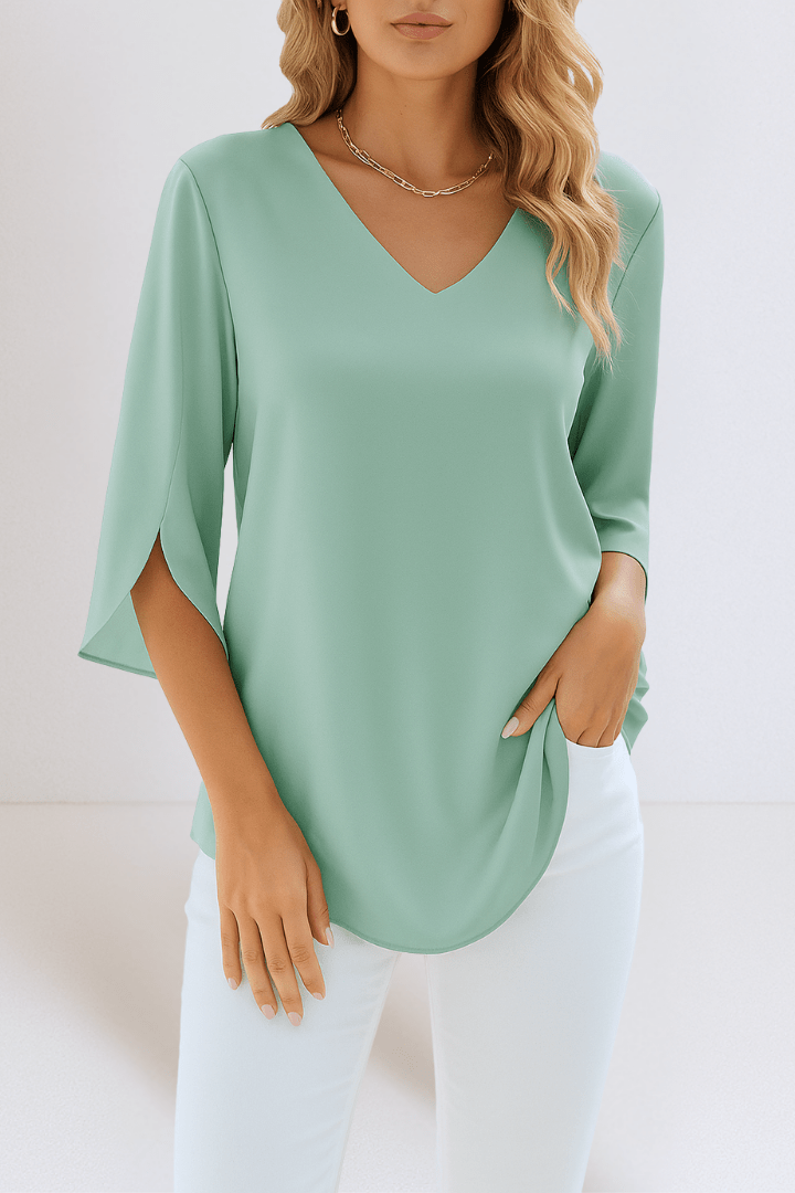Azzurra – Top elegante con scollo a V e maniche aperte