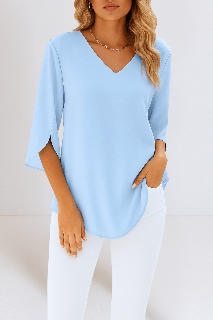 Azzurra – Top elegante con scollo a V e maniche aperte