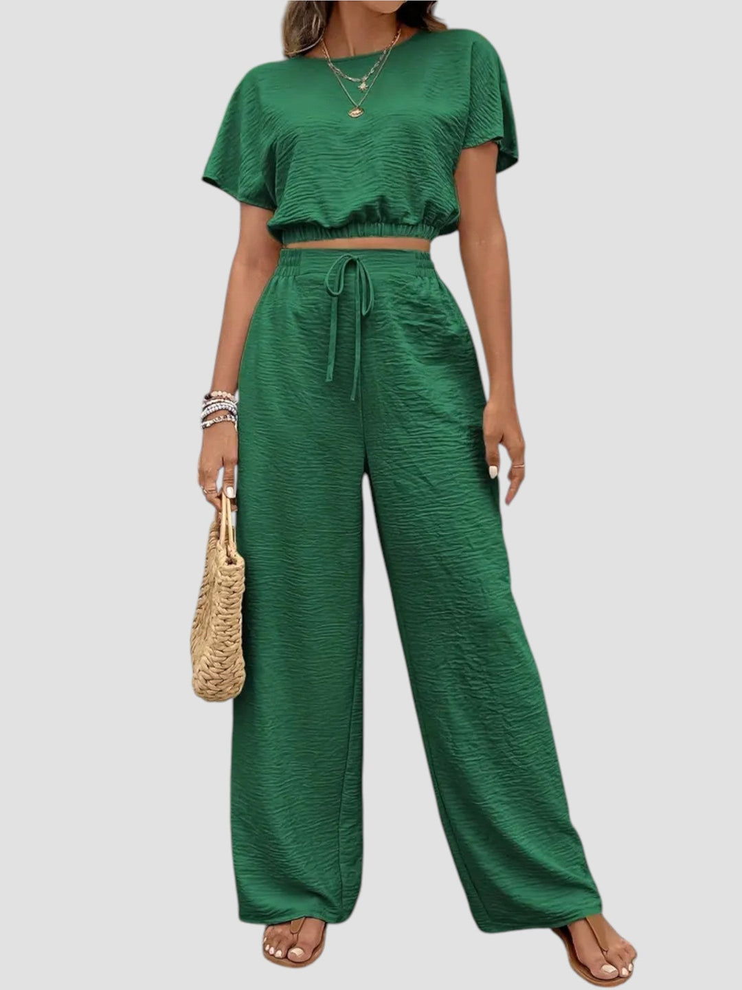 Mirella – Completo moderno con crop top e pantaloni fluidi