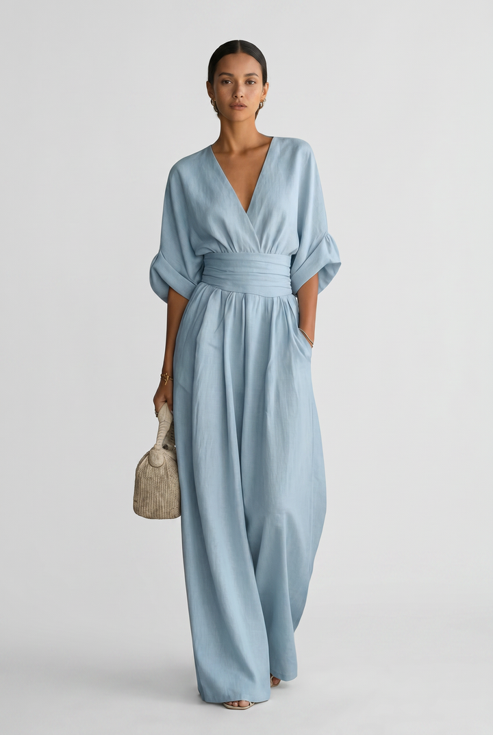 Lavinia – Tuta elegante da donna con drappeggio e vita aderente