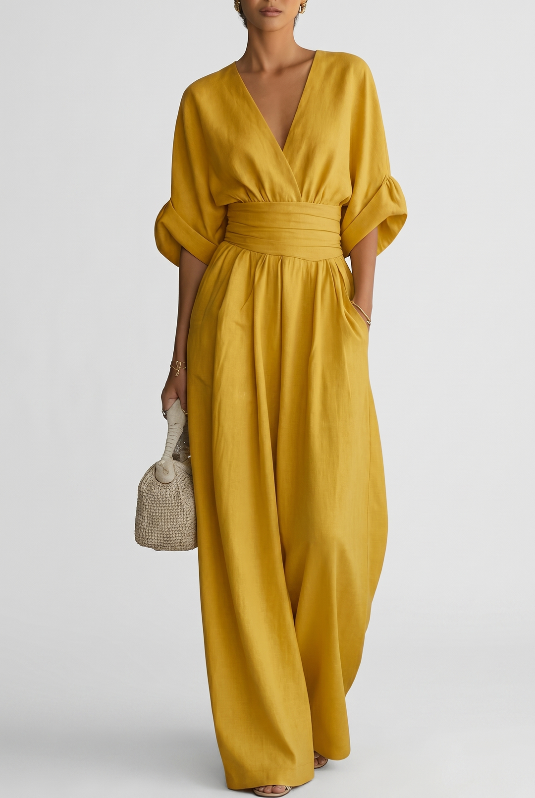 Lavinia – Tuta elegante da donna con drappeggio e vita aderente