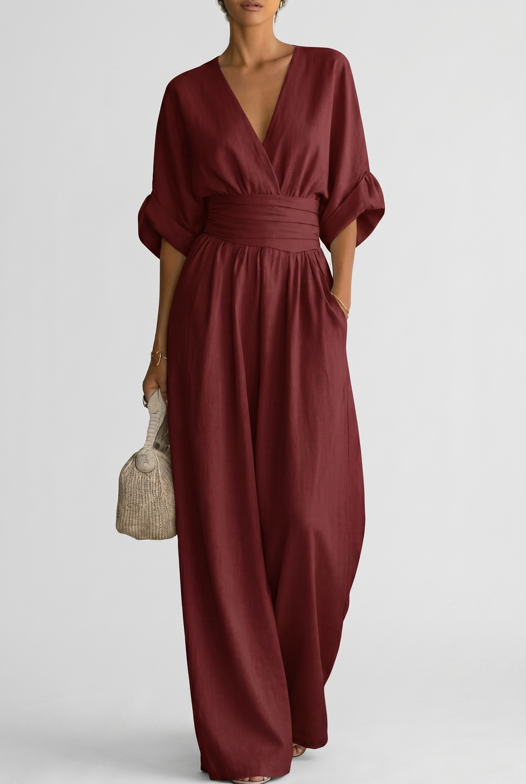 Lavinia – Tuta elegante da donna con drappeggio e vita aderente