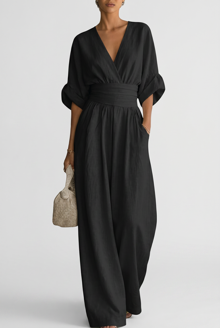 Lavinia – Tuta elegante da donna con drappeggio e vita aderente
