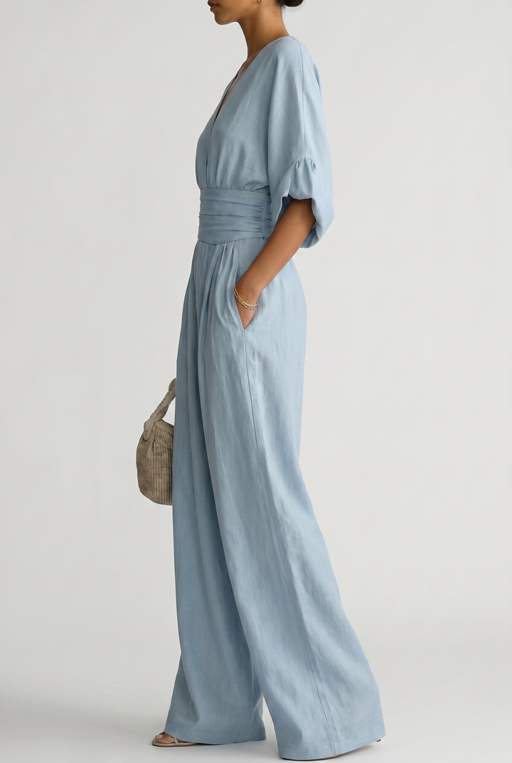 Lavinia – Tuta elegante da donna con drappeggio e vita aderente