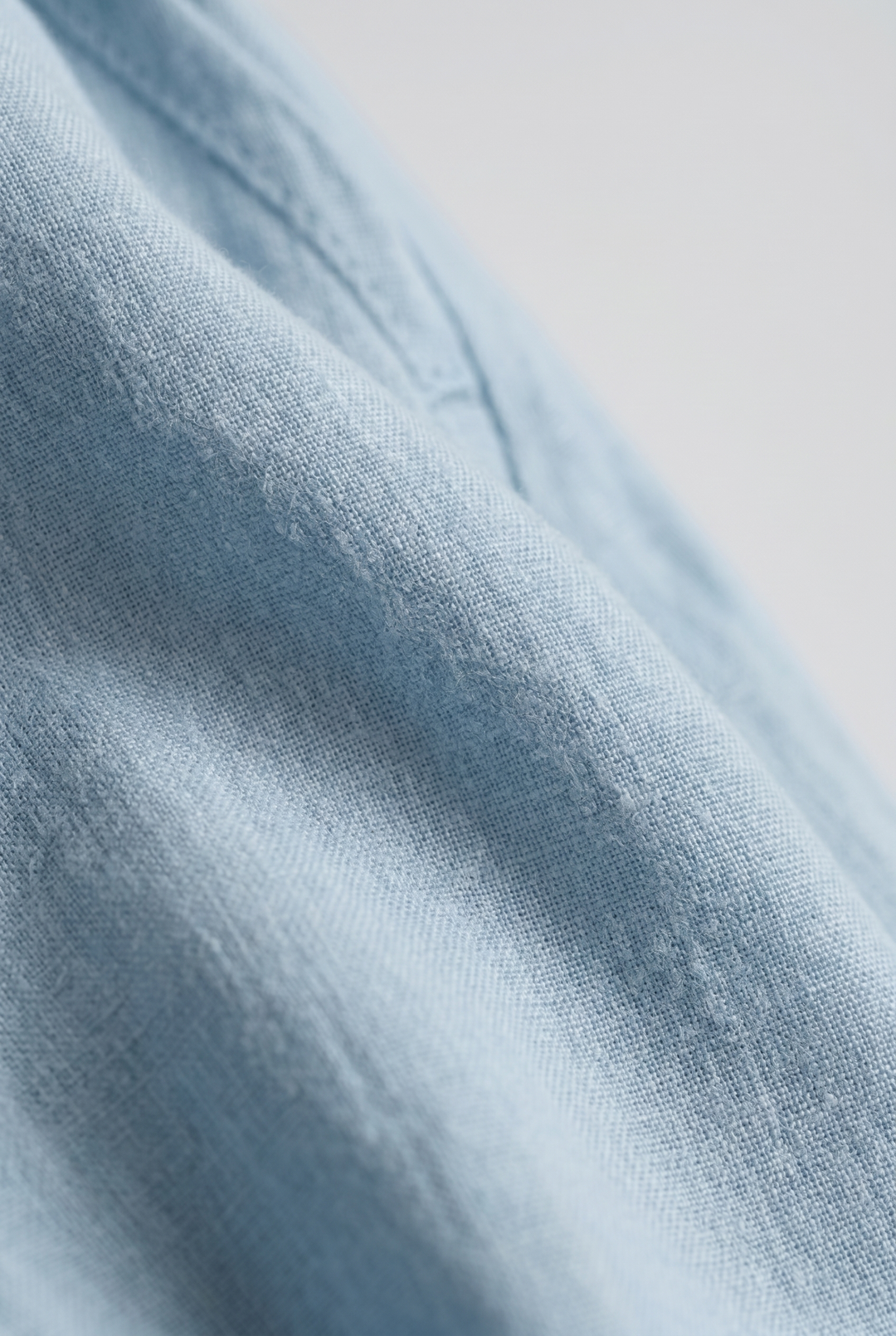 Lavinia – Tuta elegante da donna con drappeggio e vita aderente