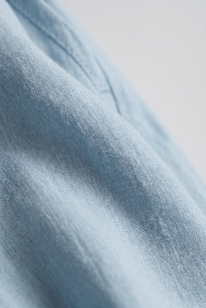 Lavinia – Tuta elegante da donna con drappeggio e vita aderente