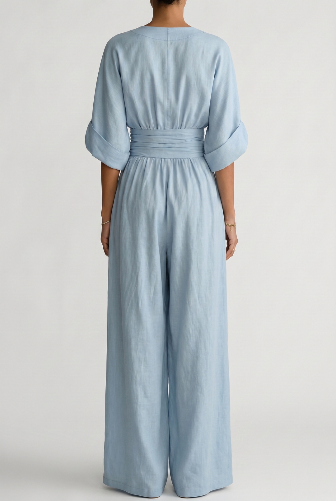 Lavinia – Tuta elegante da donna con drappeggio e vita aderente