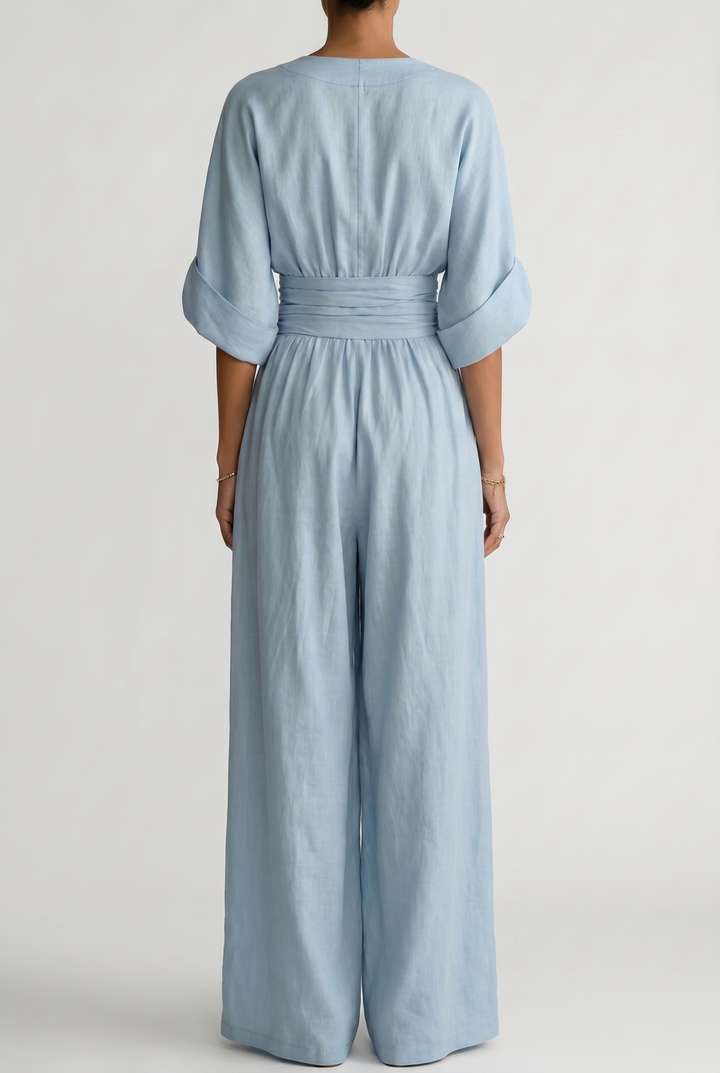 Lavinia – Tuta elegante da donna con drappeggio e vita aderente