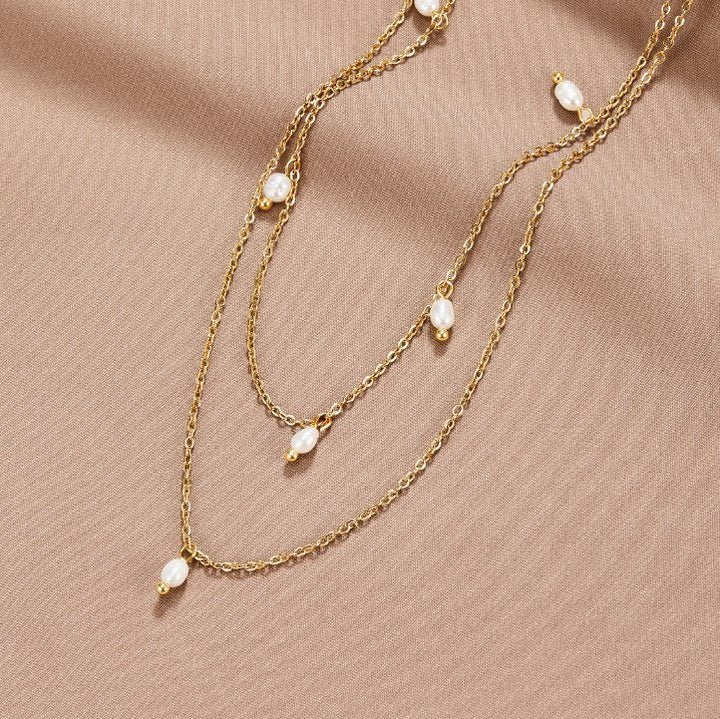Kayla | Collana Multistrato con Perle Pendenti