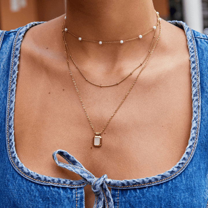 Valerie | Collana Multistrato con Ciondolo Bianco